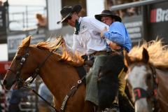 Pollockville, Alberta - July26:Bronc Star Tour Finals
Tyler Kraft picks up Toby Waldner (Cardston, AB). 
Photo credit: Logan Armstrong | crowbaitcreative.com